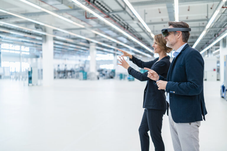 Two professionals using augmented reality headsets – Big brand or bold idea, a TLD fuels your digital future with TLDz