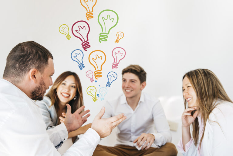 Team collaboration with lightbulb icons – TLDs powering innovation, trust, and digital control with TLDz